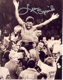 LEON SPINKS AUTOGRAPHED BOXING 8X10 VICTORY PHOTO (BOXING)