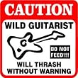 CAUTION: WILD GUITARIST will trash joke sign