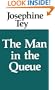 The Man in the Queue