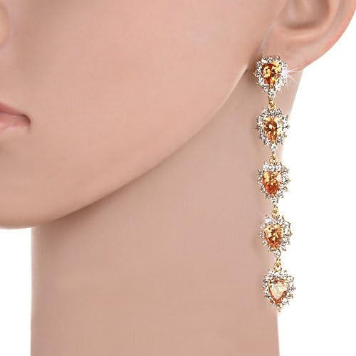 Long Heart Drop Style Swarovski crystal Earrings. Available in Red, Topaz and Clear on either 14K Gold or Silver Rhodium Plating