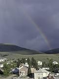 Rainbow behind Old Mining Town of Virginia City, Montana, USA Premium Photographic Poster Print by John & Lisa Merrill, 36x48