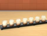 Set of 7 Fragrance Votive Candles on a Wood Table Runner