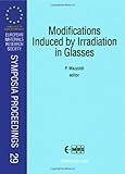 Modifications induced by irradiation in glasses