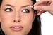 Pretty Girl Receives Eyeshadow from Make-up Artist - 60W x 40H - Peel and Stick Wall Decal by Wallmonkeys