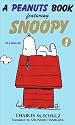 A peanuts book featuring Snoopy (1)