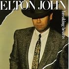 Click here to buy Breaking Hearts by  Elton John .