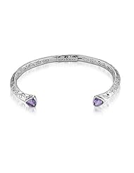 Sterling Silver This sterling silver amethyst Sara Blaine bangle bracelet is sure to add a touch of sophisticated style to any outfit.