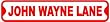 JOHN WAYNE LANE sign street movie star tough