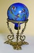 Blue Peacock Hand-blown Glow in the Dark Glass Gazing Globe With Decorative Metal Stand (6 inch)