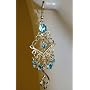 Saka's Silver Toned Dangling Cat Chandelier Earrings