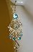 Saka's Silver Toned Dangling Cat Chandelier Earrings