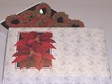 Scott's Cakes 1/2 lb. Milk Chocolate Covered Pretzel with Christmas Jimmies in a Poinsettia Box