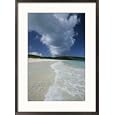 A strip of cumulous clouds follows this receding, tropical shoreline Photography Framed Art Poster Print by Michael Melford, 21x29