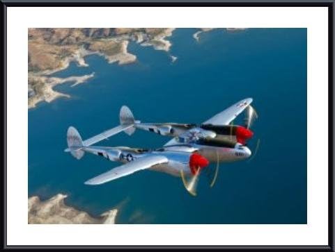 A Lockheed P-38 Lightning fighter aircraft in flight., framed black metal, white matte 48 x 32 Inches.