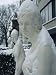 Snow Adds Modesty to a Row of Nude Statues in a Winter Storm Photographic Poster Prin...