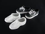 A Set of Two Pairs of Ken Casual Shoes Made for the Ken Doll