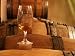 Glass of White Wine on Bung Hole Stopper, Wine Cellar of Jo Pithon, Loire Valley, France Photographic Poster Print by Per Karlsson, 12x16