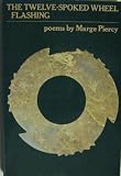 The twelve spoked wheel flashing : poems