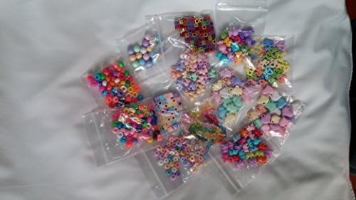 500 Pcs of Pastel Charms with 12 Different Patterns for Rubberband Rainbow Loom Bracelets.