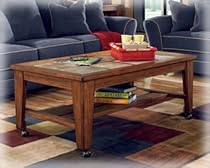 Hot Sale Toscana Cocktail Table with Casters By Ashley Furniture