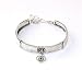 Aviv Hand Made Silver Bracelet with dangle hearts shape silver bit, set with garnet stone