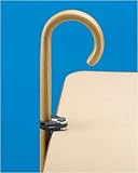 `Cane Holder Allows cane to lean on the table * Slip-resistant foam disc helps hold a cane to most f