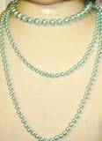 Hand Crocheted Turquoise Gimp Skull Cap Offered in Combination with Very Long Simulated Blue Pearl Necklace Includes One Short Chain Earrings