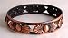 Copper colour metal bangle repeating acanthus leaf and ball design