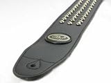 Black leather 2.5″ guitar strap, from Guitar Tech. Features rows of rounded silver studs.