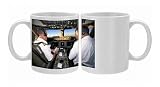 Pilots on flight deck of Jumbo Boeing 747 of Air New Zealand with sunrise ahead Photo Mugs