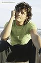 Orlando Bloom (Sitting) Movie Poster Print - 24" X 36"