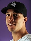 Colorado Rockies Photo Day, SCOTTSDALE, AZ - FEBRUARY 24: Ubaldo Jimenez Photographic Poster Print by Harry How, 9x12