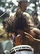 Drummer Playing Instrument with Hands During Woodstock Music Festival Photographic Poster Print by Bill Eppridge, 18x24