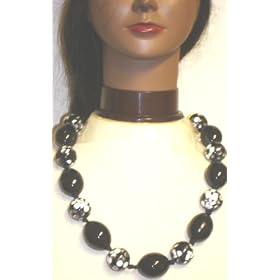 Click here to buy Large Black and Spotted Beads Necklace for Women and Teens by Gita.