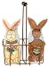 Set of 2 Vintage Look Baby Bunny Glass Milk Bottles in Rusty Wire Baskets