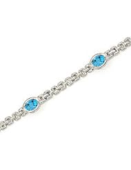 14kt Yellow Gold Oval Blue Topaz Bracelet.