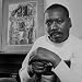Artist Jacob Lawrence Sitting in Front of One of His Paintings Premium Photographic P...
