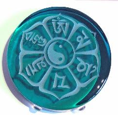 Om Mani Padme Hum, a Tibetan Buddhist mantra of compassion in Tibetan script. A freestanding table top Art Glass Blessing designed and created by Nancy Gong, glass artist. Shown is the 5" dia. emerald green color. Also available in sapphire blue, opal black, bronze, yellow and kiwi green - contact seller. Sure to be treasured by your special person, teacher or confidant.