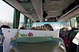Wallmonkeys Peel and Stick Wall Decals - Tourists in a Luxury Chartered Bus on Road during a Tour - 24"W x 16"H Removable Graphic