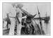 Historic Print (L): [The Philippines]: Jolo - pearl fishing diver [in diving suit, seated on boat], ready to