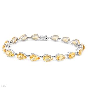Superb Bracelet With 18.40ctw Genuine Citrines Beautifully Designed in White Gold. Total item weight 10.4g Length 7.5in