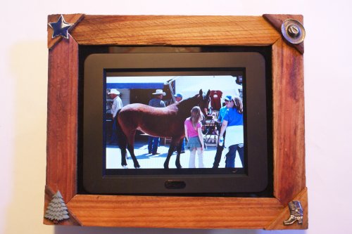 Voclan 8LCD by SHARP.Includes Western Redwood frame with cowboy accents. The ONLY ONE that fits most 8x10 picture frames for future decor changes.Superior 800x600 resolution.Play MP3  Video in stereo