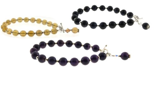 Click here to buy Set of Three Sterling Silver Bracelets with Swarovski Crystal - Amethyst - Citrine - Garnet by Tery K Jewelry.