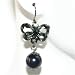 Elegant flower shaped earings with single black drop