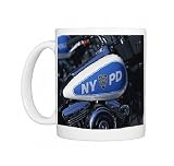 Close-up of Harley Davidson motorcycle with insignia of the City of New York Photo Mugs