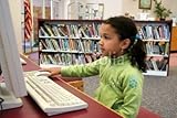 IMAGE OF Wallmonkeys Peel and Stick Wall Decals - Child in a School Library - 48