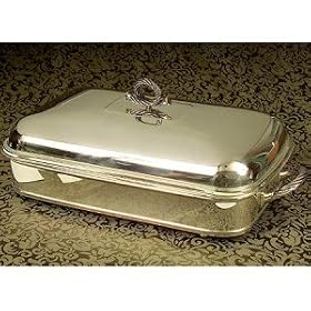 Click here to buy 3 QUART SILVER PLATED CABLE DESIGN DOMED OBLONG BAKER by Godinger.