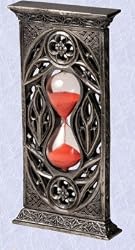 medieval hourglass with gothic celtic tracery a wizard's time piece