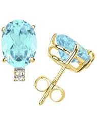 11X8mm Oval Aquamarine and Diamond Stud Earrings in 14K Yellow Gold
