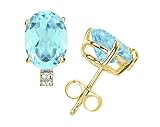 7X5mm Oval Aquamarine and Diamond Stud Earrings in 14K Yellow Gold
